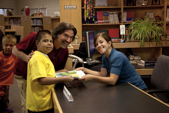 The librarian helped us borrow books to bring home.